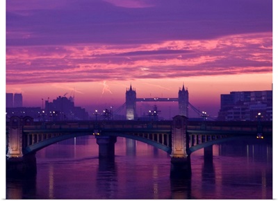 Sunrise over the Thames and Tower Bridge in London.