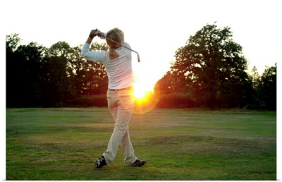 Sunset golf swing
