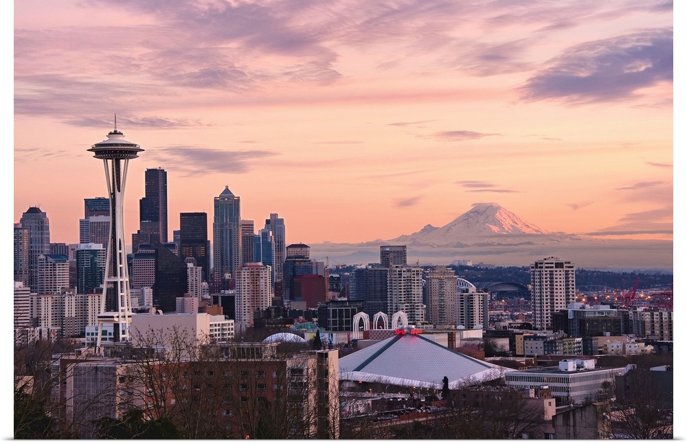Sunset view of downtown Seattle and Mount Rainier in distance, as seen from Kerry Park on Queen Anne Hill.