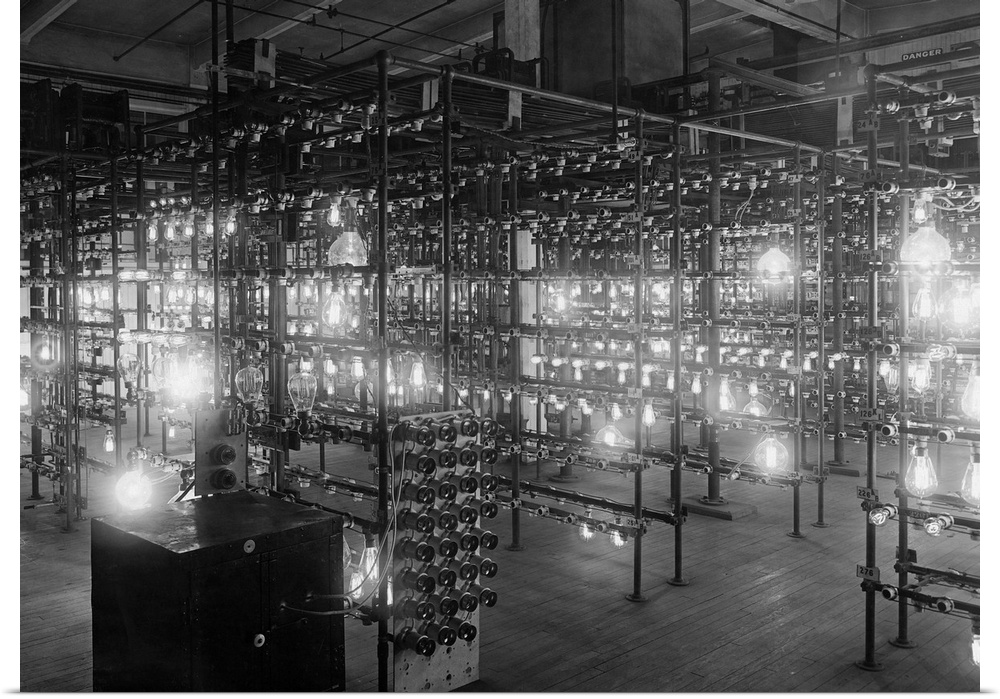 Racks of light bulbs are tested for lasting power at the Harrison Lamp Works.