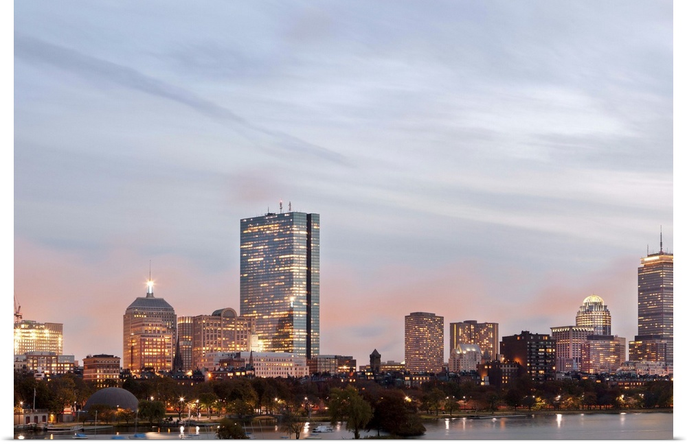 The city of Boston from Charles River at dusk