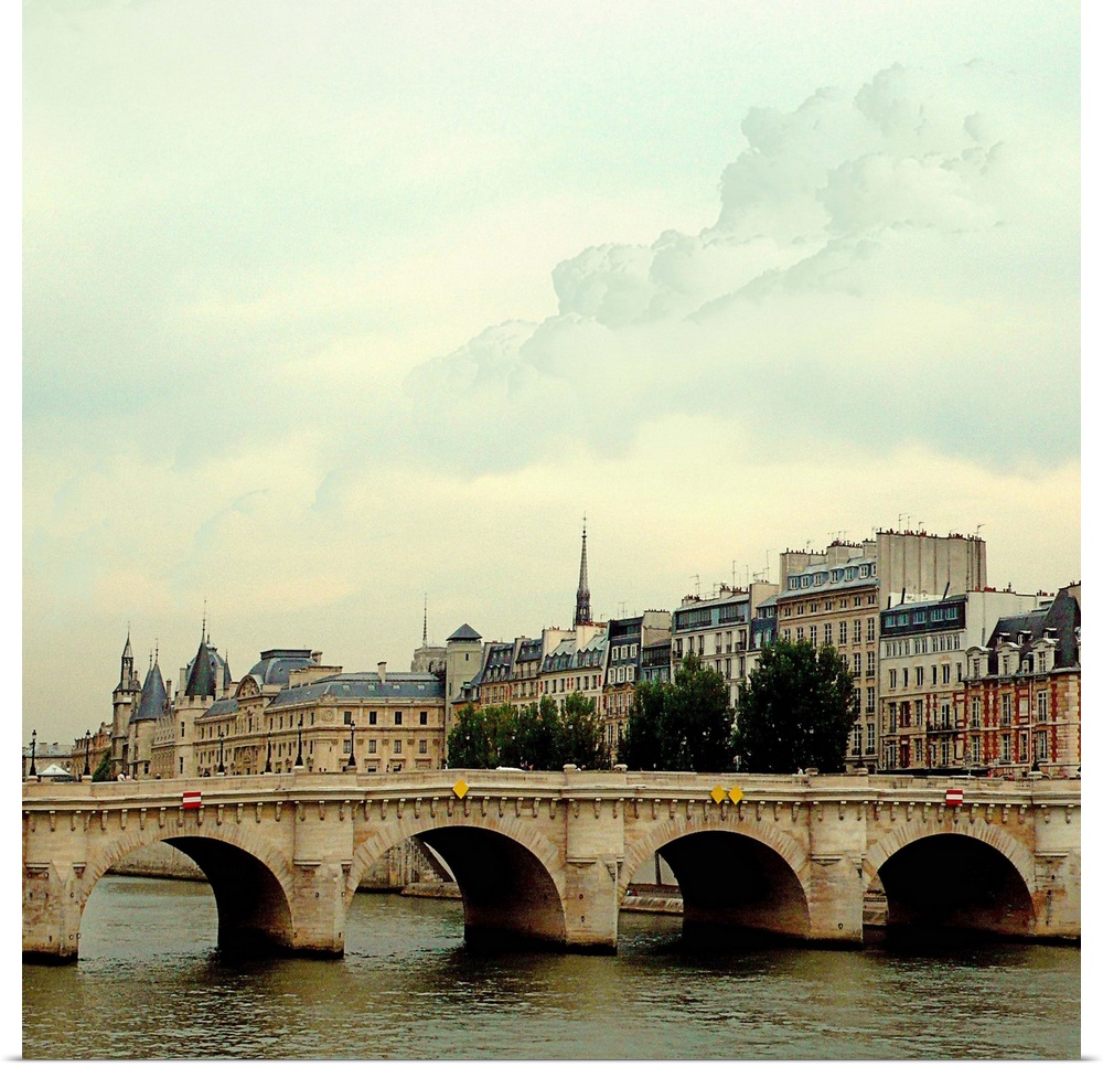 The many bridges crossing the Seine River in Paris France.
