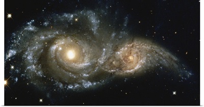 These two spiral galaxies were seen near the constellation Canis Major.