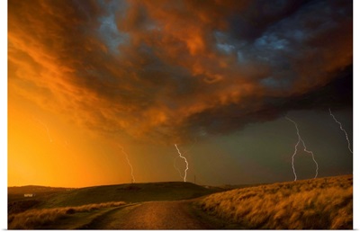 Thunderstorm And Orange Clouds At Sunset