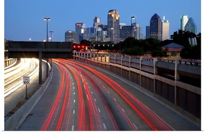 Trails of vehicle lights along US Highway, Dallas, Texas