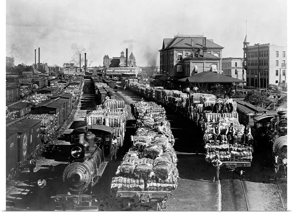 Bales of cotton fill flatbed rail cars at the Texas Central Railway Yards in Houston.