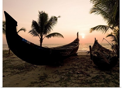 Two canoes on the beach at the Arabian Sea, Kerala, India