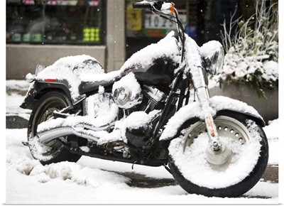 USA, New York City, motorbike covered with snow