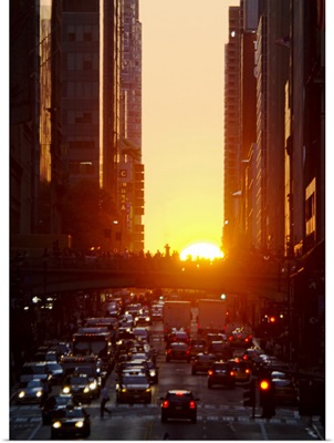 USA, New York, New York City, Sunset illuminating busy street