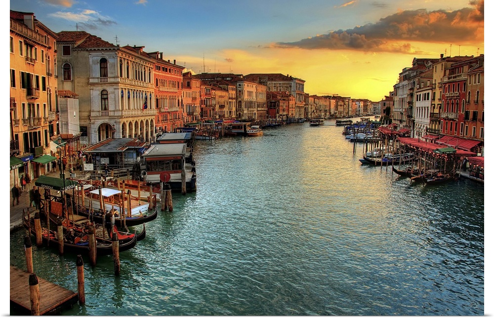 From the Rialto Bridge, looking down the Grand Canal showing the stunning color's of  sunset.
