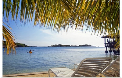 View A Person In A Kayak Off The Coast Of The Caribbean Sea At Anthony's Key Resort