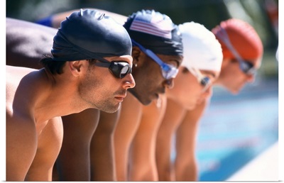 view of male swimmers at the start of a race