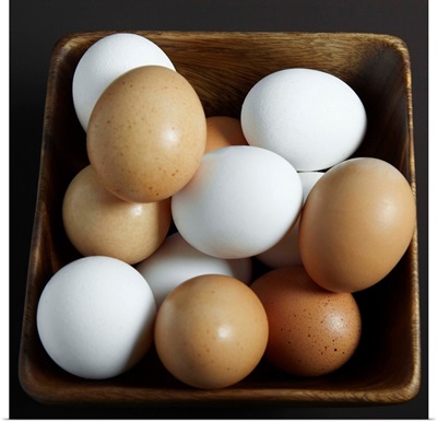 White And Brown Eggs In Basket