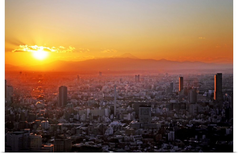 Winter sunset over Tokyo with Mount Fuji in distance, Japan