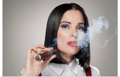Woman smoking a cigar, portrait