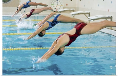 Women swimmers competing in race