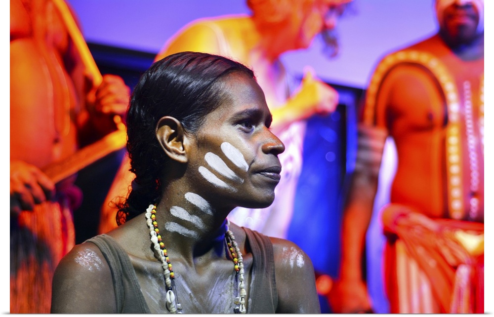 Yirrganydji Aboriginal woman and men during cultural show in Queensland, Australia.