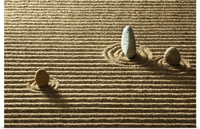 Zen stone on sand