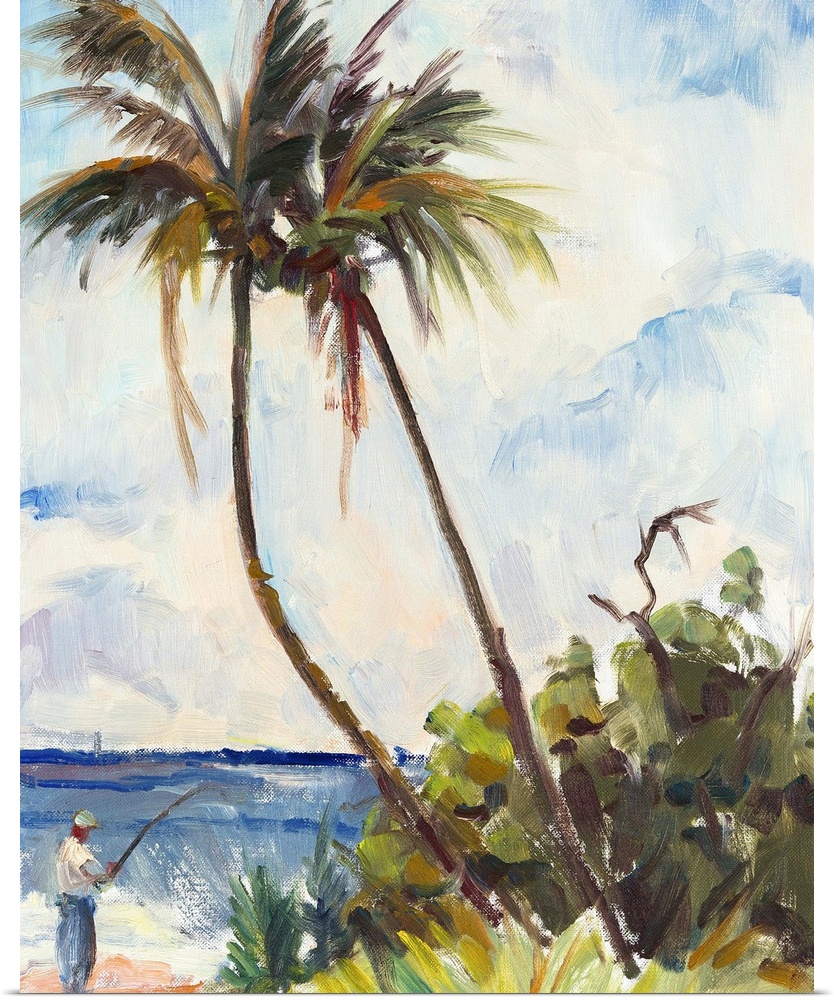 A man fishing on the beach under two tall palm trees.