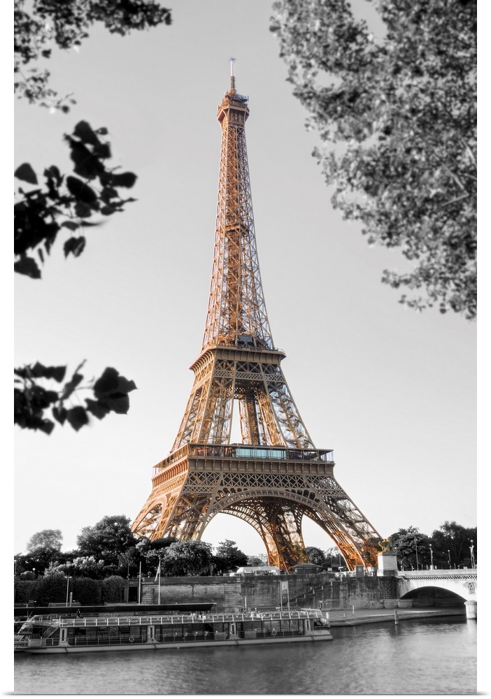 Photograph of the Eiffel Tower with the background in black and white.