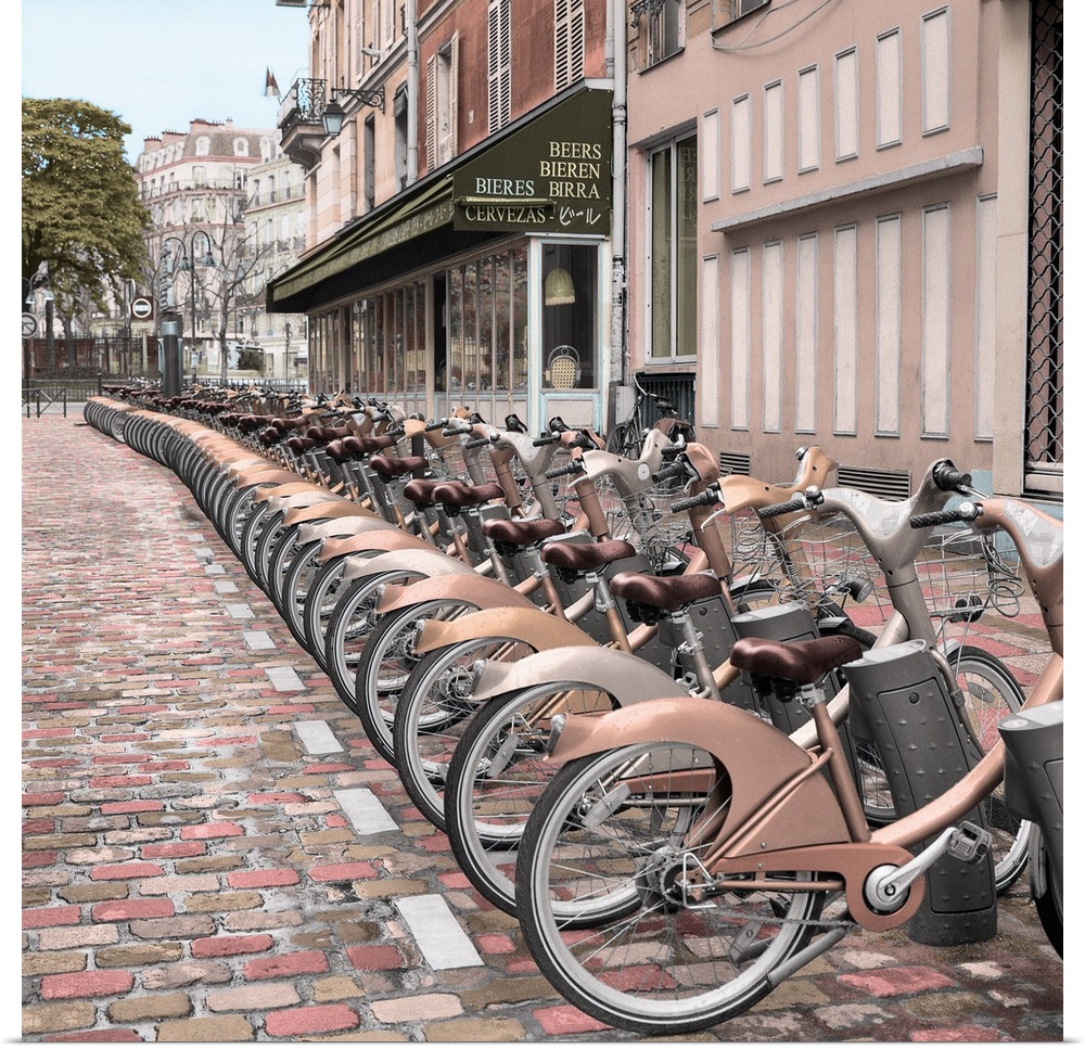 Square image of a row of rental bicycles in Paris, France.