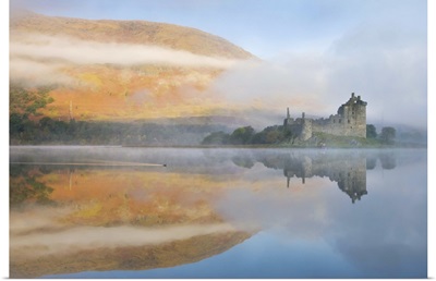 A misty morning beside Loch Awe with views to Kilchurn Castle, Scotland