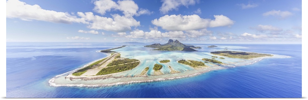 Aerial view of Bora Bora island with airstrip visible, French Polynesia.