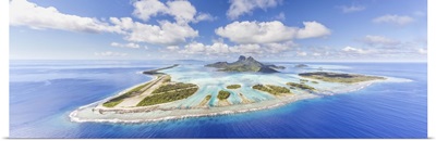 Aerial view of Bora Bora island with airstrip visible, French Polynesia