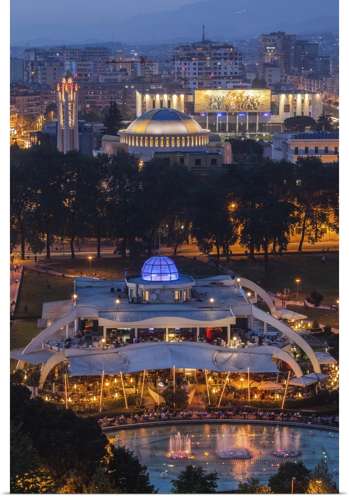 Albania, Tirana, elevated overview of Rinia Park and Taiwan Restaurant complex and Regency Casino, dusk