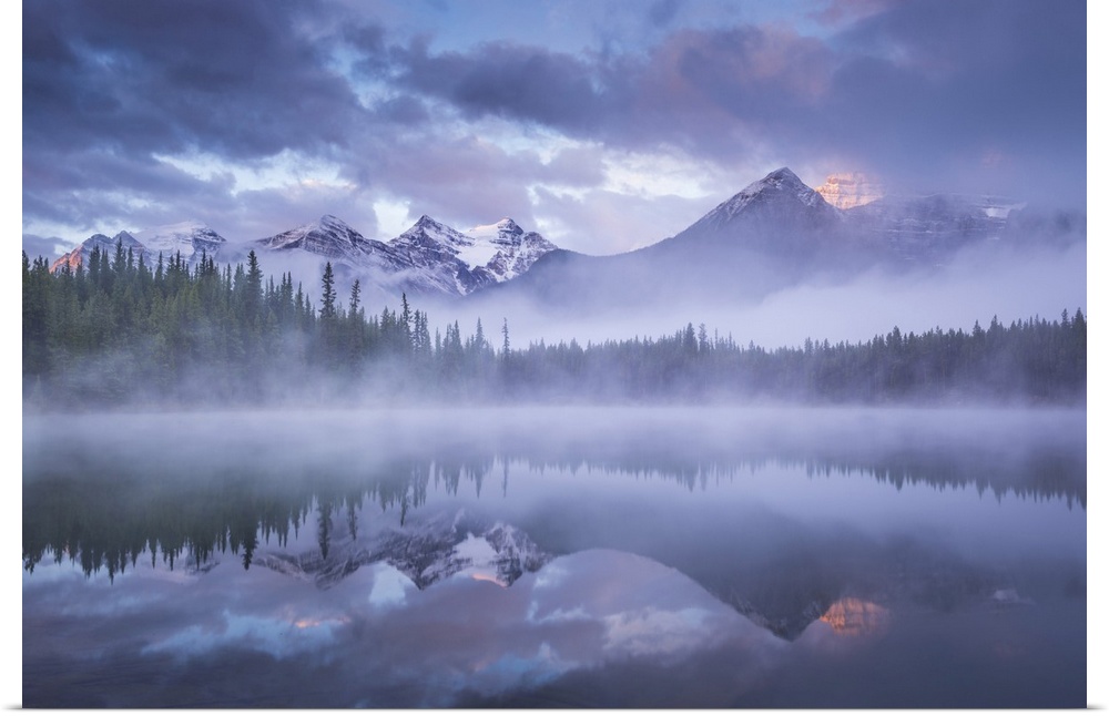 Atmospheric misty sunrise in Banff National Park in the Canadian Rockies, Alberta, Canada, Autumn, September, 2016. Albert...