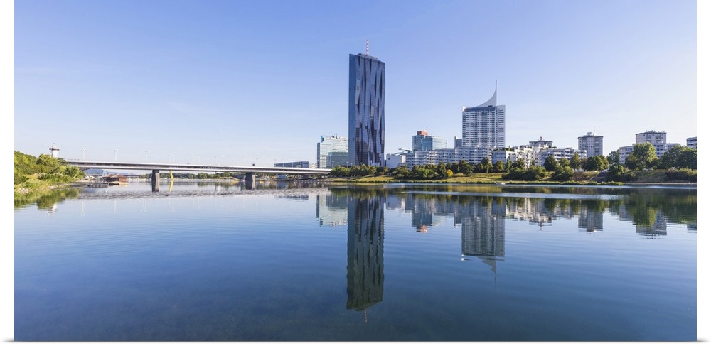 Austria, Vienna, Donau City reflecting in New Danube River
