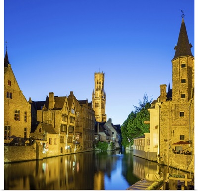 Belfort van Brugge and medieval buildings on the Dijver canal from Rozenhoedkaai at dusk