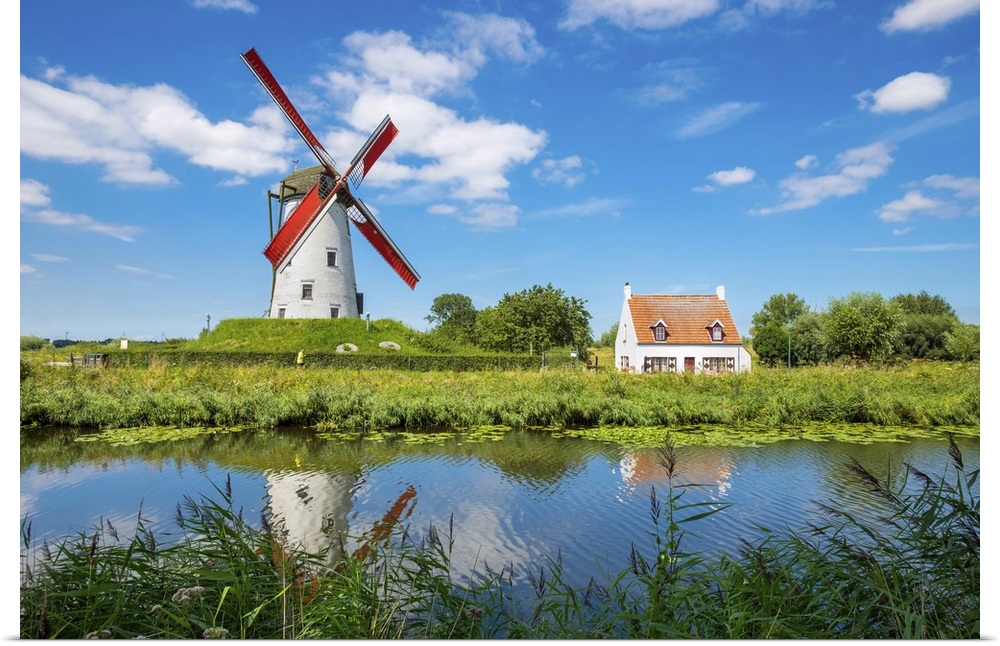 Belgium, West Flanders (Vlaanderen), Damme. Hoeke Mill (Hoekemolen) windmill on the Damse Vaart canal.