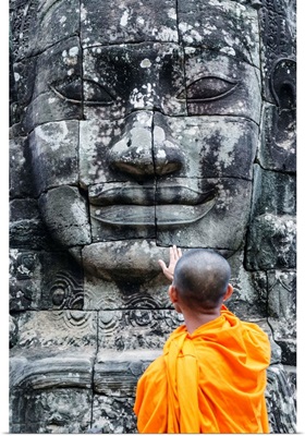 Cambodia, Siem Reap, Angkor Wat complex. Monks inside Bayon temple