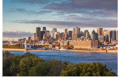 Canada, Quebec, Montreal, Elevated City Skyline From The St. Lawrence River, Dawn