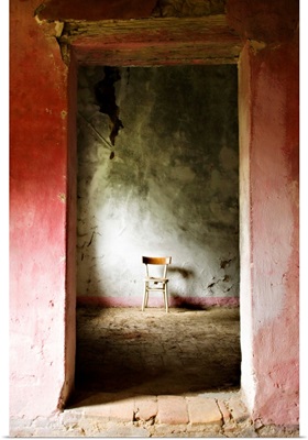 Chair in a deserted farm near San Quirico d'Orcia, Valle de Orcia, Tuscany, Italy