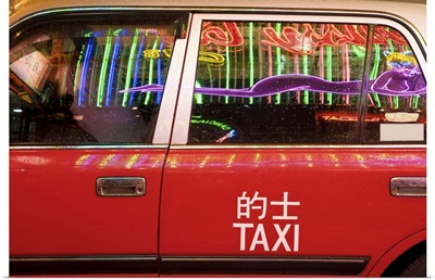 China, Hong Kong, nightlife neon reflected in a Hong Kong taxi window
