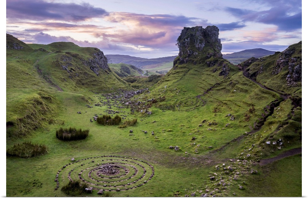 Circular rock pattern on green landscape near Castle Ewen at sunset, Fairy Glen, Isle of Skye, Highland Region, Scotland, ...
