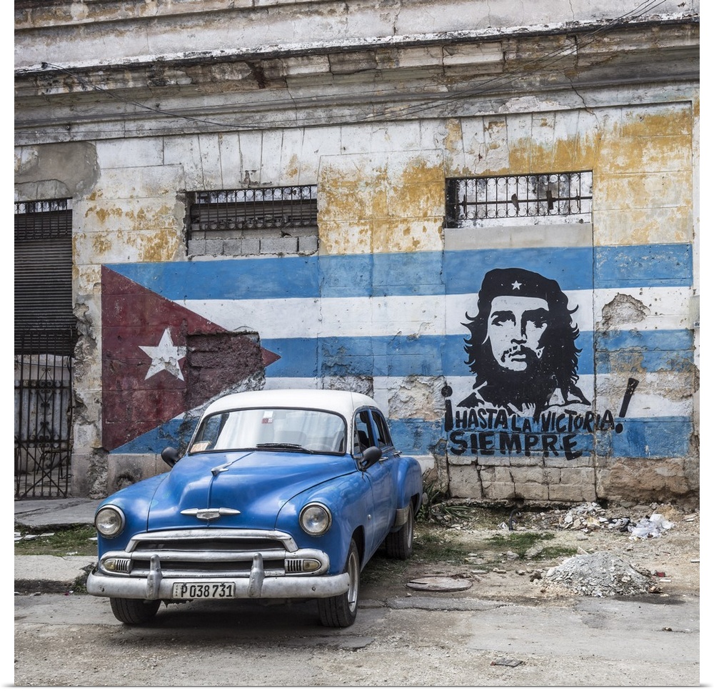 Classic American car and Cuban flag, Habana Vieja, Havana, Cuba.