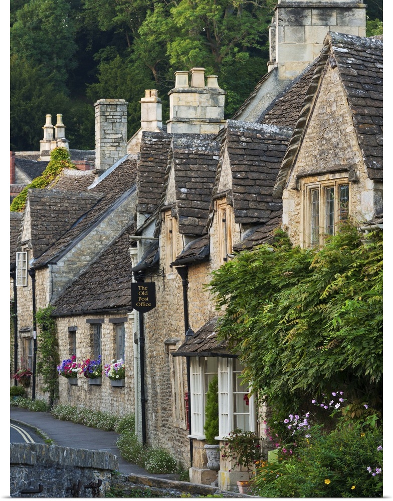 Picturesque cottages in the beautiful Cotswolds village of Castle Combe, Wiltshire, England. Autumn (September)