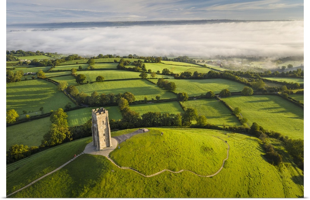 Early morning mists at St Michael's Tower on Glastonbury Tor in Somerset, England. Autumn (September) 2020.