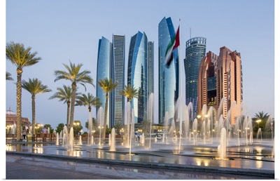 Etihad Towers time lapse viewed over the fountains of the Emirates Palace Hotel