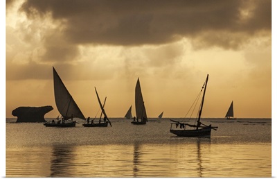 Fishermen in traditional wooden sailing boats leave Watamu to fish in the Indian Ocean