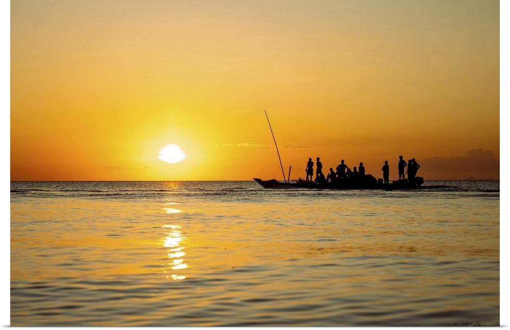 Fishermen returning home on dhow at sunset,, Indian Ocean, Zanzibar, Tanzania