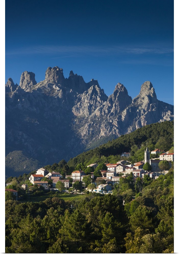 France, Corsica, Corse-du-Sud Department, La Alta Rocca Region, Zonza, elevated town view with the Aiguilles de Bavella peaks