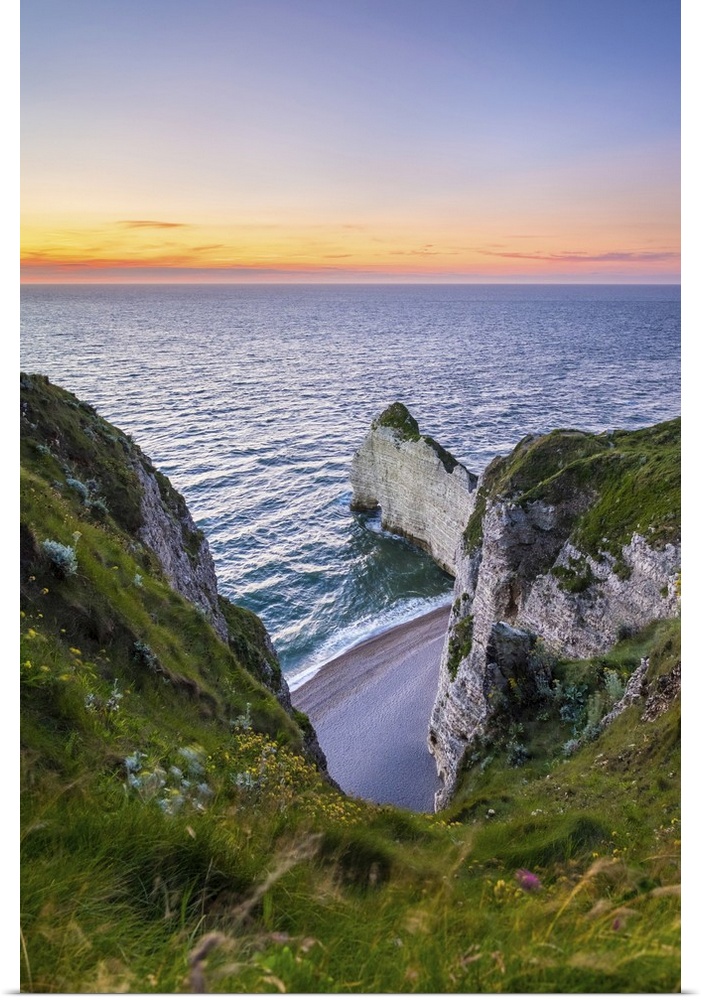 France, Normandy (Normandie), Seine-Maritime department, Etretat. White chalk cliffs at sunset.
