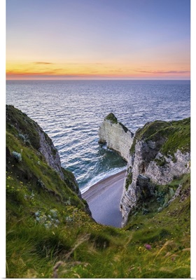 France, Normandy, Seine-Maritime department, Etretat. White chalk cliffs at sunset