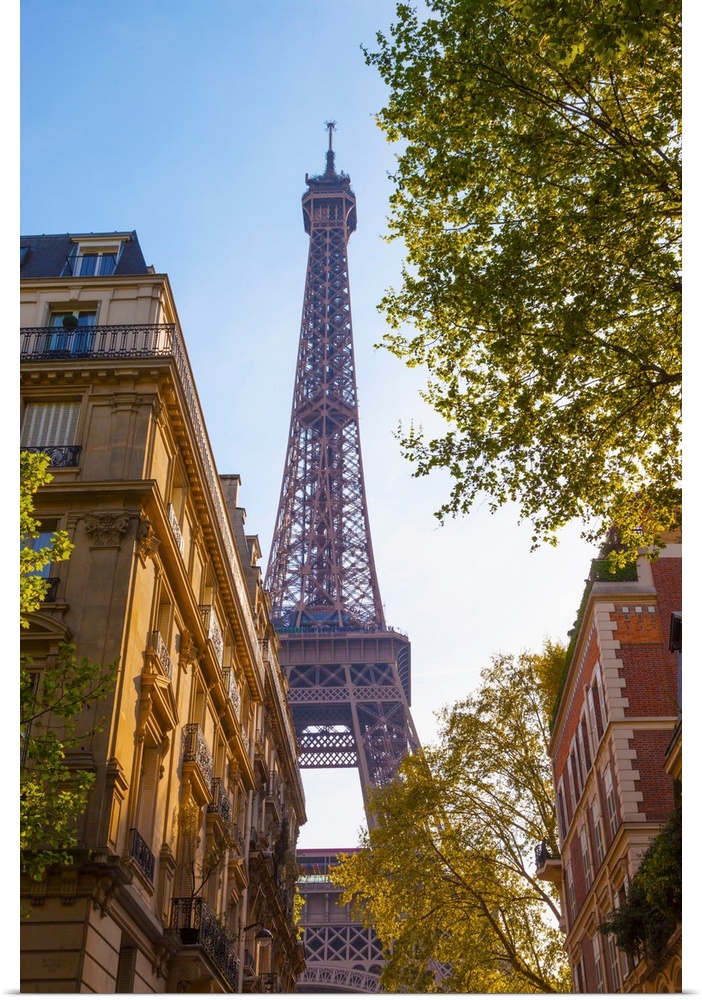 France, Paris, Eiffel Tower, view through street.