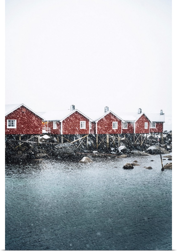 Hamnoy village with snowflakes, Reine Bay, Lofoten Islands, Nordland, Norway.