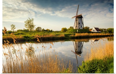Hoeke Windmill Reflecting In Canal, Damme, Belgium